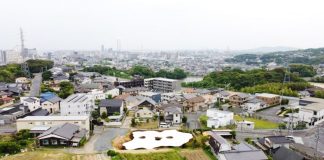 Junya Ishigami hides mud-covered house and restaurant below ground level in Japan – Dezeen
